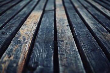 A close-up shot of a wooden floor with grain and texture visible