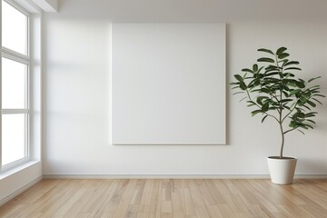 A green plant sits in a pot in front of a picture frame on a wall