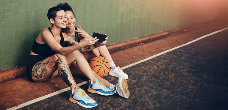 Basketball, peace sign and outdoor selfie of women, fitness and sport ground for social media post. Emoji, people and court break for memory at club, online photography and athletes for tournament