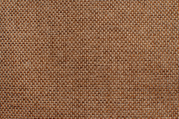 Background - burlap. Brown linen fabric cloth texture, natural textile pattern.