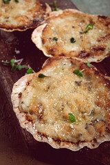 scallop shells, stuffed, baked with cheese, in the oven, julienne with scallops,
