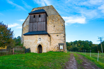 A photo of the ruins of the Koruna Svate Marie Monastery near the village of Trebarov. The ancient stone walls and arches stand as a testament 