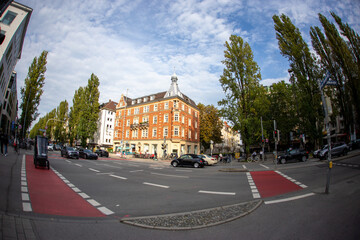 Munich, September 23, 2024: Pedestrian crossing in Munich with cityscape and urban life