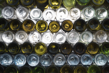 Empty beer bottles rack. Full frame. Alcohol theme.
