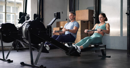 Gym Fitness Workout Exercise Using Rowing Machine