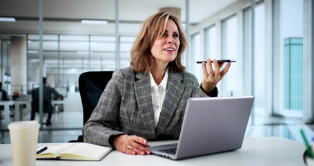 Professional Businesswoman Using Smartphone App For Client Call