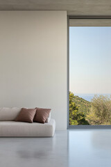 Modern minimalist living room with a coastal view and natural light in the late afternoon