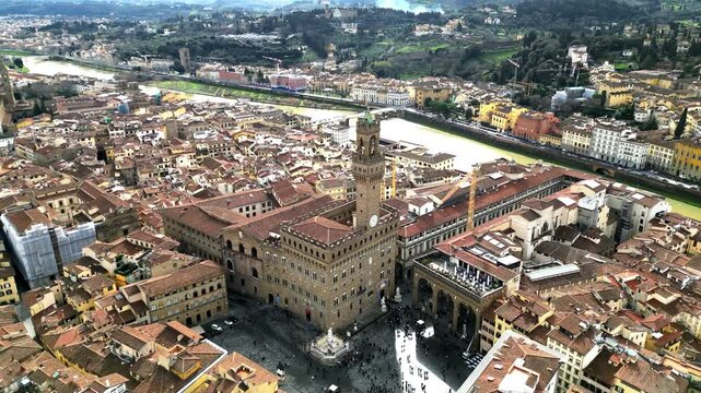 Orbit aerial view of Palazzo Vecchio and Piazza della Signoria, Florence, Italy