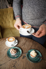 person holding a cup of coffee
