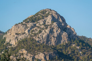 Very large rocky hill on a sunny day