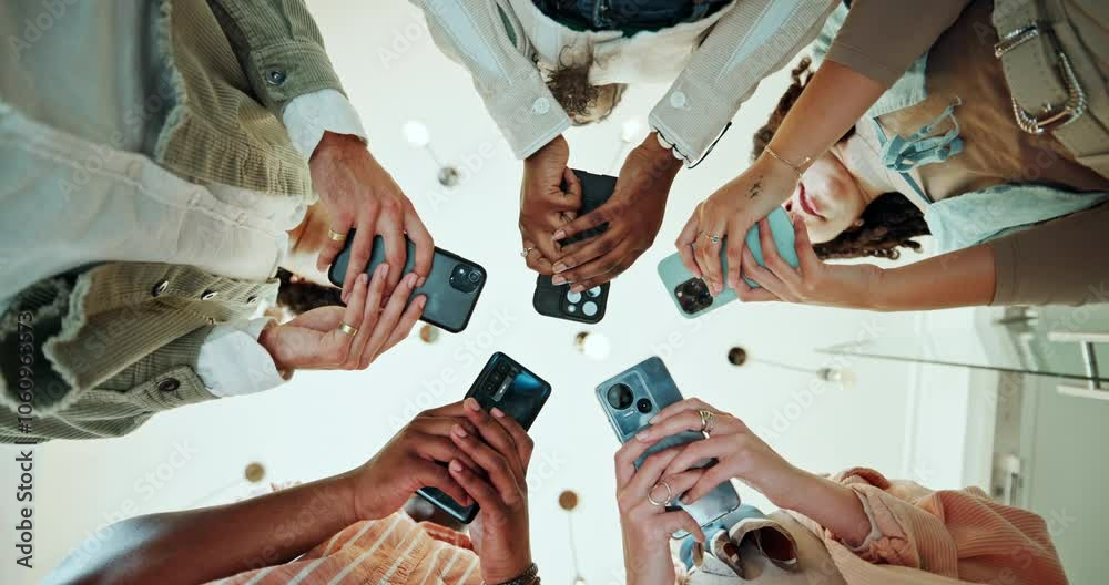 Poster Business people, hands and typing below with phone in circle for data sync, share or communication at office. Low angle, group or employees with mobile smartphone for network or connectivity together