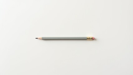 Close-up of a sharpened pencil with a light gray body on a white background, ideal for writing or drawing. Everyday things for creativity and work.