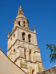 Fototapeta premium Baroque bell tower of the Church of Santa Maria de Mediavilla. Medina de Rioseco, Province of Valladolid, Castilla y León, Spain, Europe