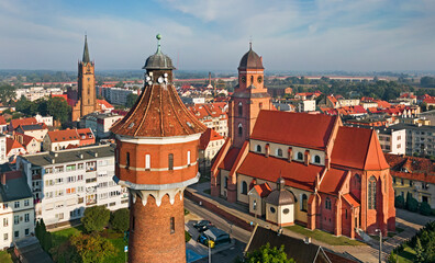 Żmigród near Wrocław in Lower Silesian Voivodeship in south-western Poland, aerial view of churches and water tower © lukaszmalkiewicz.pl