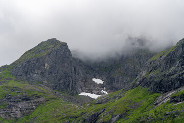 Cloud covered mountain peak in Lofoten island, Norway