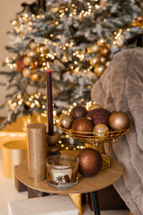 Bed with New Year's decorations. New Year's interior. Christmas tree.