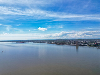 Fototapeta premium High Angle View of Historical and Modern British City Centre of Liverpool, Maritime city in northwest England, United Kingdom. Aerial Footage Was Captured with Drone's Camera on May 5th, 2024