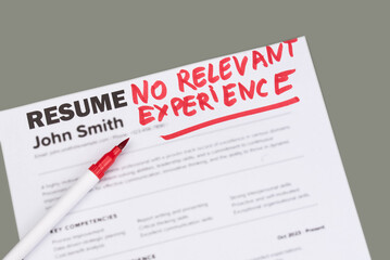 Fototapeta premium Fake mock CV (curriculum vitae) for John Smith, rejected by HR as not the right candidate with No relevant experience. Concept of job search, hiring mismatch, recruitment process, and rejection. 