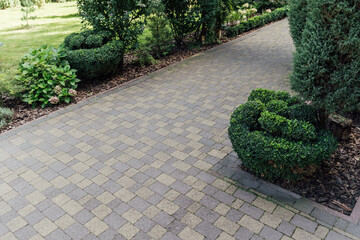 Beautiful summer garden with a walkway winding its way through