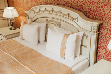 minimal double bed with white mattress in luxury hotel bedroom