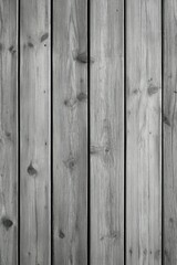 Fototapeta premium Close-up of weathered wooden planks arranged vertically in gray tones