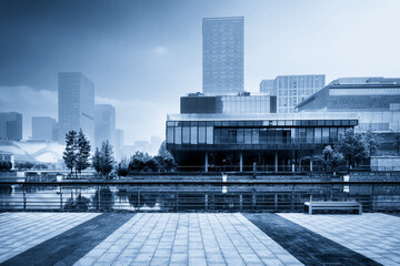 Serene Urban Landscape: Modern Architecture Reflecting on Water