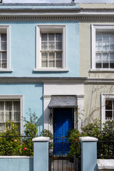 Touristic route on Notting Hill, walking on streets with colourful houses, Portobello road, city life, wealthy neighbourhoods in London, UK