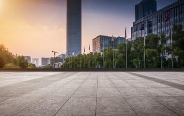 Serene Urban Landscape at Sunset with Modern Architecture and Greenery