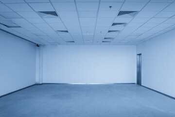 Fototapeta premium Minimalist Empty Room with Soft Blue Lighting for Modern Design Inspiration