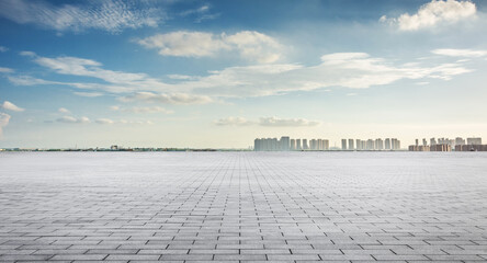 Expansive Urban Landscape with Clear Blue Sky and City Skyline