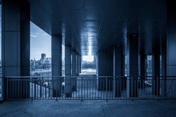 Modern Architectural Interior with Urban View in Blue Tones