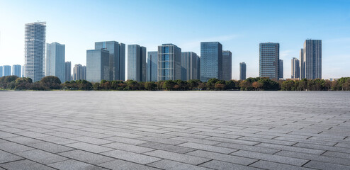 Expansive Urban Cityscape with Modern Skyscrapers Against a Clear Sky