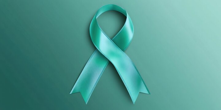 Turquoise colored ribbon, symbol of support for various cancers. Wear or display it to raise awareness and show solidarity.