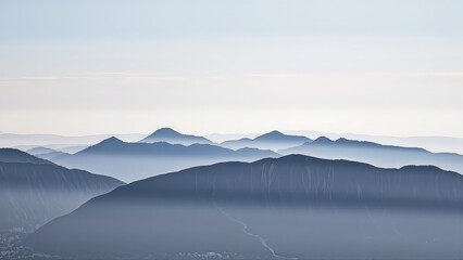 Fototapeta premium Generative AI, Minimalist Aerial View of Serene Mountain Ranges with Soft Cloud Layers