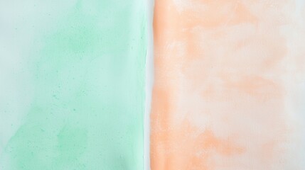 Fototapeta premium Soft pastel watercolor background featuring a blend of green and orange hues, creating a serene and dreamy atmosphere, perfect for various design projects