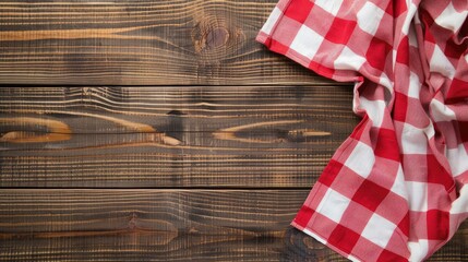 Mockup of picnic table setting with checkered napkin on wooden table, red and white tablecloth banner, kitchen towel with gingham pattern, restaurant dishcloth on wood background.