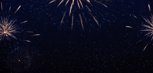 Sylvester New Year ,a long firework as fireworks in the dark blue night sky