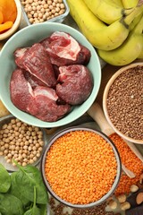 Different products rich in iron on table, flat lay. Diet plan for anemia