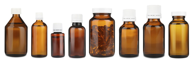 Many different glass bottles isolated on white