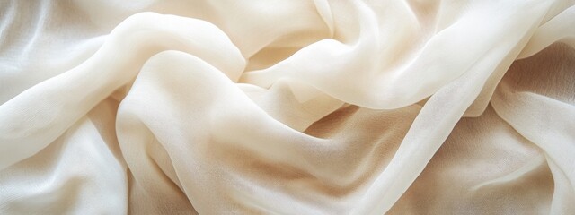Fototapeta premium A soft, flowing fabric in light shades, creating an elegant and serene texture.