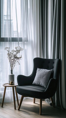 minimalist modern living room chair and side table by window with grey curtains