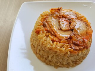 Asian food Fan Choy.t is a one dish meal which consists of rice that steamed together with char siew (barbecued meat) and hard-boiled egg