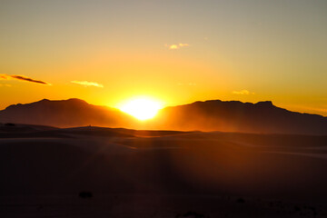 sunset over sand dunes