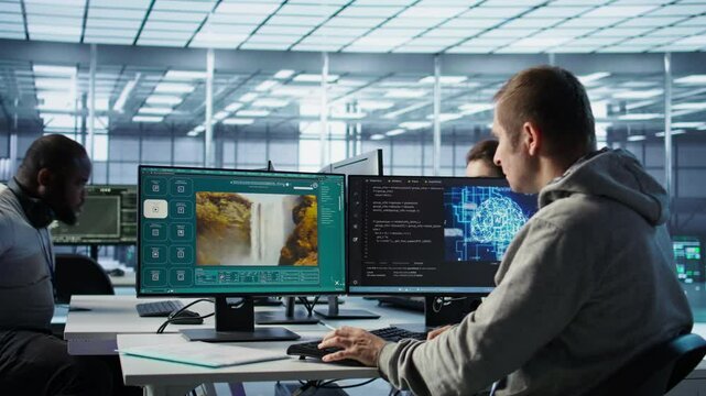 Engineer in server hub making generative artificial intelligence website generating videos using diffusion model algorithms. Employee coding AI virtual assistant producing clips, camera B