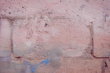 Grunge red concrete background. Textured plaster wall. Color of the year 2025 concept. Top view, layout for design. Surface with peeling shabby pattern.