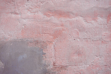 Grunge pink concrete background. Textured plaster wall. Color of the year 2025 concept. Top view, layout for design. Surface with peeling shabby pattern.