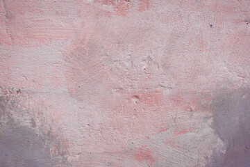 Grunge pink concrete background. Textured plaster wall. Color of the year 2025 concept. Top view, layout for design. Surface with peeling shabby pattern.