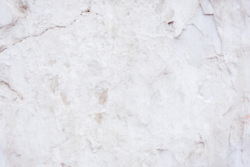 Grey concrete wall with natural defects. Fragment of the cement surface with natural texture....