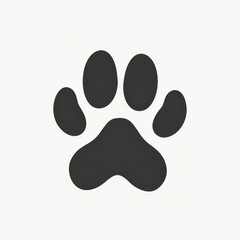 A black paw print is displayed prominently on a light backdrop, showcasing the unique pattern of...