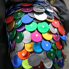 Obraz premium Colorful circular metal scales create a textured pattern.